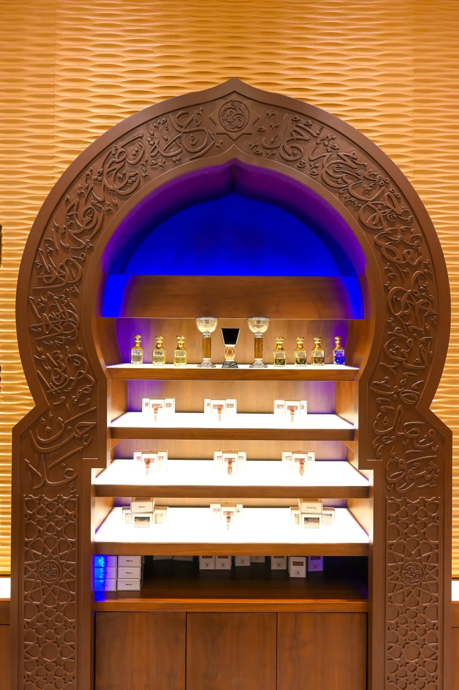 Arabian Oud luxury brand experience design Dubai - UMI Group retail interior showcasing immersive perfume discovery areas, premium materials, and award-winning commercial interior design UAE